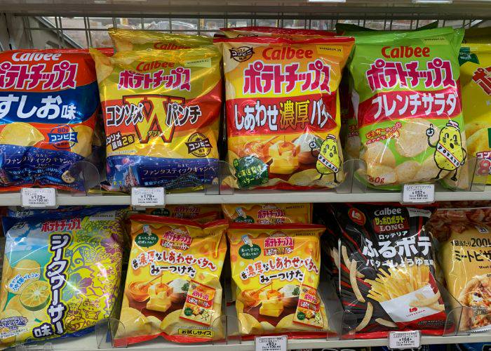A konbini shelf filled with Calbee Chips.